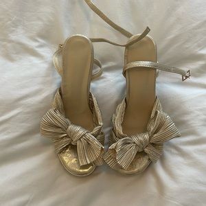 Gold bow platform heels
